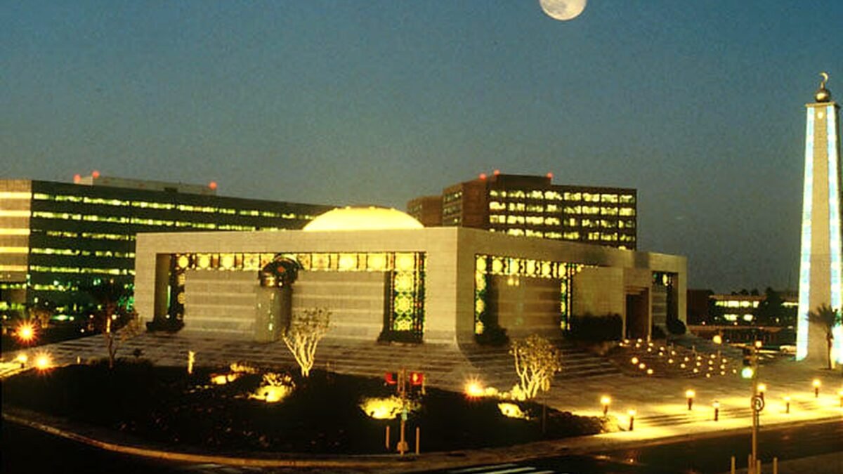 File photo: the Saudi Aramco core area in Dhahran, including the company's headquarters and office buildings, at night.