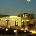 File photo: the Saudi Aramco core area in Dhahran, including the company's headquarters and office buildings, at night.