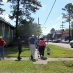File photo: Voters queue on a sidewalk outside the Jefferson Parish Registrar of Voters office in Kenner, Louisiana, in October 2020.