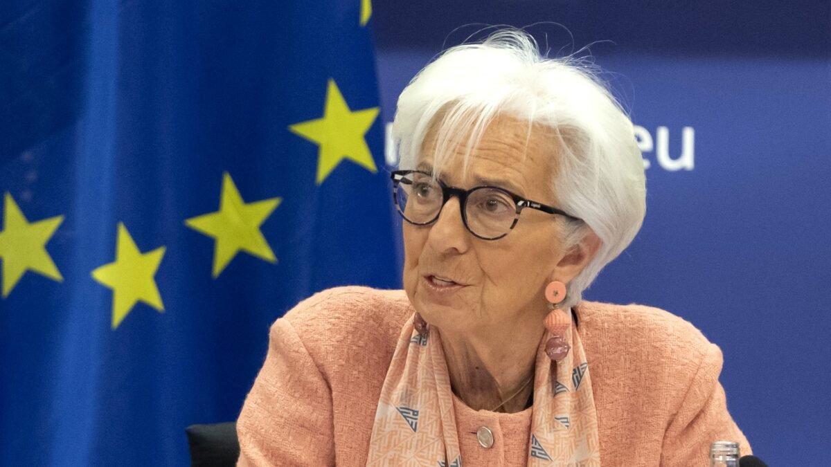 Christine Lagarde, President of the European Central Bank, speaking beside a European Union flag at a monetary dialogue in March 2025.