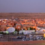 File photo: The MINURSO headquarters compound in Laayoune, Western Sahara, at dusk, with United Nations vehicles parked inside.