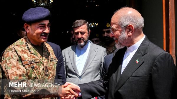 Field Marshal Asim Munir shakes hands with Iranian parliament speaker Mohammad Baqir Qalibaf in Tehran, with Foreign Minister Abbas Araghchi behind them. File photo, April 2026.