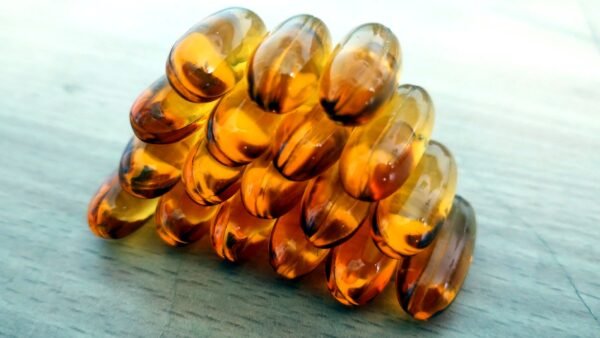 File photo: Omega-3 fish oil softgel capsules. The EMT2 trial used a prescription form of purified EPA (icosapent ethyl), not over-the-counter fish oil.