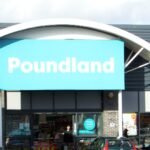 The entrance of a Poundland store in Bridgwater, with the large turquoise Poundland sign above the doors and shoppers outside.