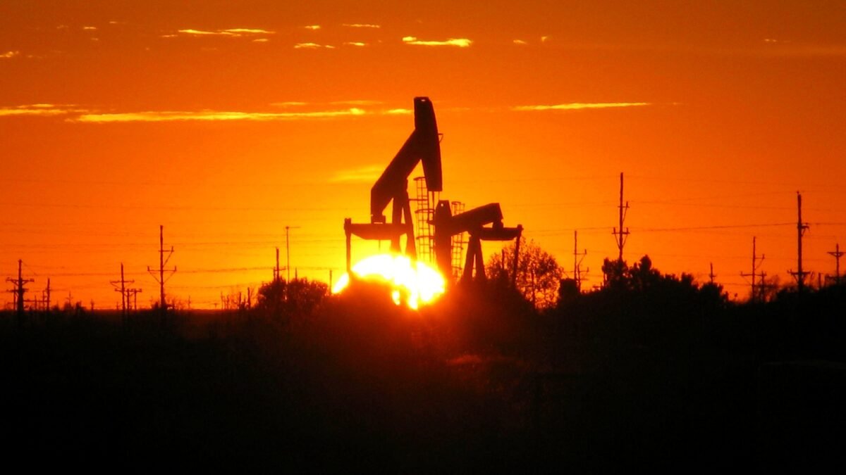 Pumpjack silhouetted against the sunset near Midland, Texas.