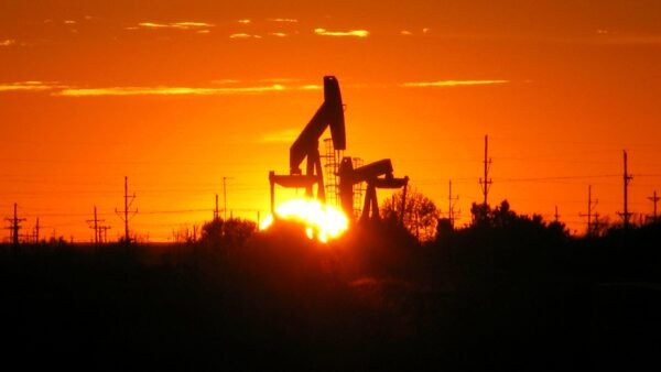 Pumpjack silhouetted against the sunset near Midland, Texas.