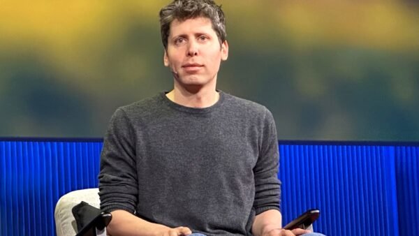 OpenAI CEO Sam Altman speaking on stage at TED in 2025