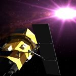 Artist's illustration of NASA's Neil Gehrels Swift Observatory in orbit, with a gamma-ray burst flaring behind it.