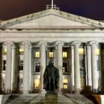 File photo: the US Treasury Department building in Washington, D.C., at night.