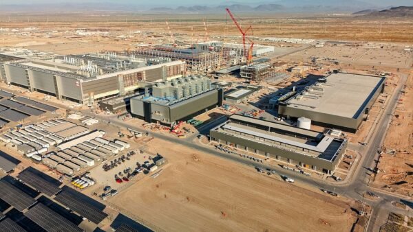 File photo: TSMC's Fab 21 under construction in Phoenix, Arizona — cranes and fab buildings at a TSMC construction site.