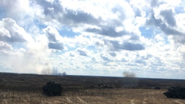 File photo: armoured vehicles conduct a live-fire exercise at CFB Wainwright, Alberta.