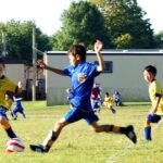 File photo: children play in a youth soccer match in the United States.